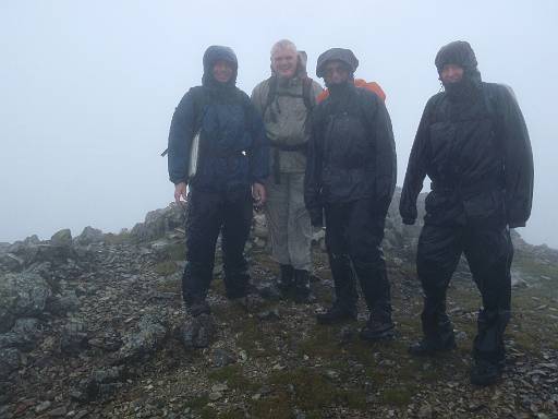 12_40-1.jpg - Tony, Phil, Paul and Mick on Great End. Just a tad damp.